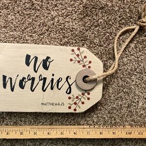 Decorative wooden wall piece. “No worries”!